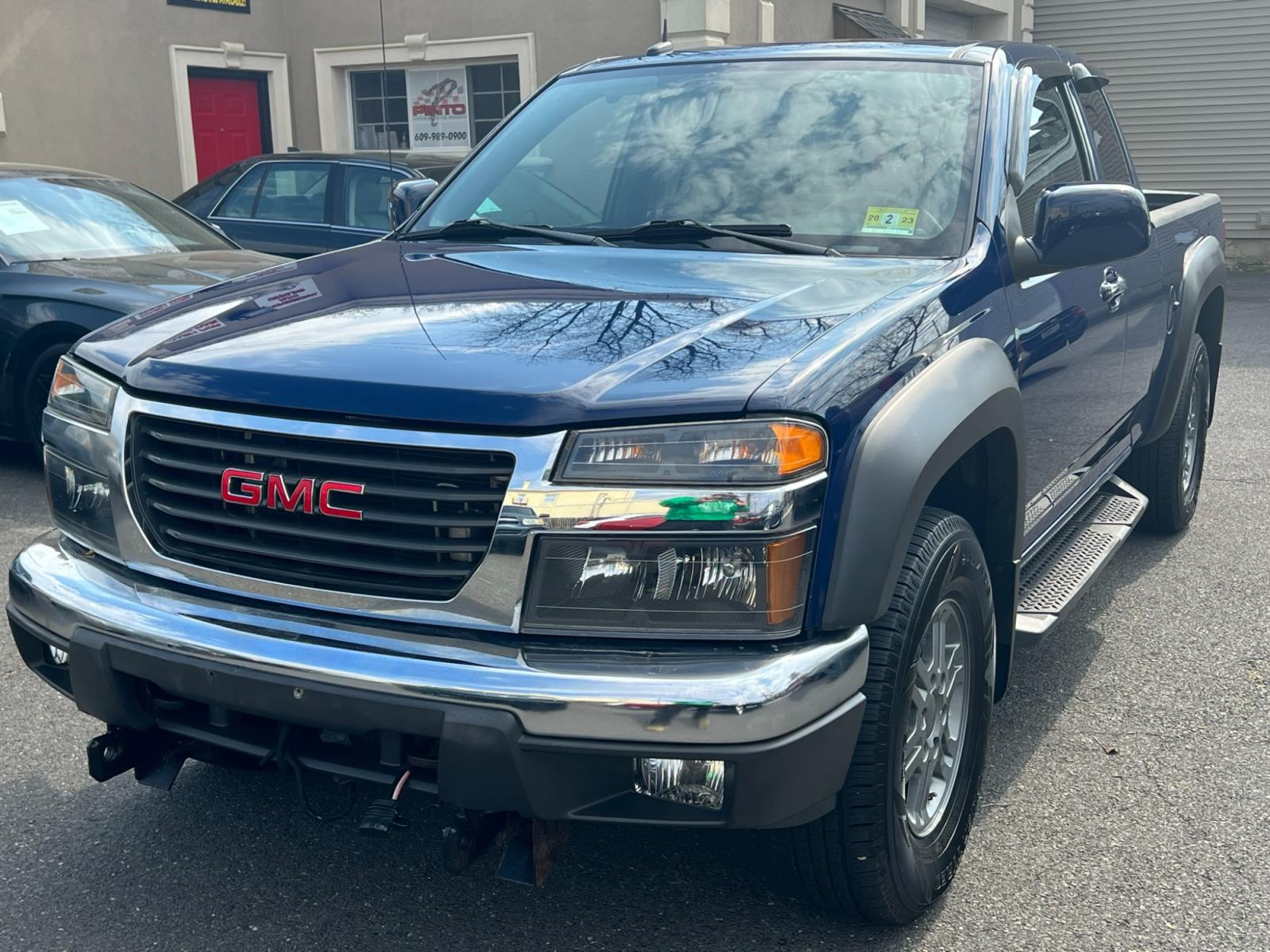 2012 Blue /gray GMC Canyon SLE Ext. Cab 4WD (1GTJ6MF98C8) with an 2.9L L4 DOHC 16V engine, located at 1018 Brunswick Ave, Trenton, NJ, 08638, (609) 989-0900, 40.240086, -74.748085 - Whether you are looking for a knock around truck for light duty errands or looking for a plow truck for your business, this GMC Canyon fits the bill perfectly! Just serviced and well maintained with low miles! Call Anthony to check it out! (609)273-5100 - Photo #3
